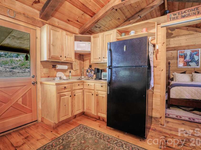 440 Huskey Road, Bryson City, NC 28713.  MLS# CAR4373659, YatesRealty ID 14570. Bunkhouse Kitchen
