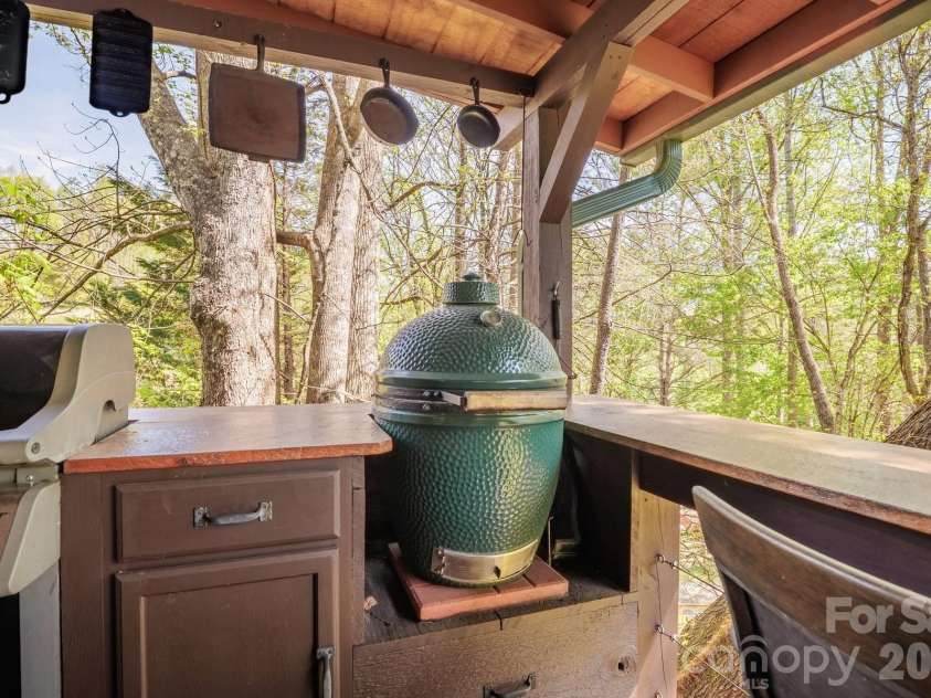 440 Huskey Road, Bryson City, NC 28713.  MLS# CAR4373659, YatesRealty ID 14570. Outdoor Kitchen Main House