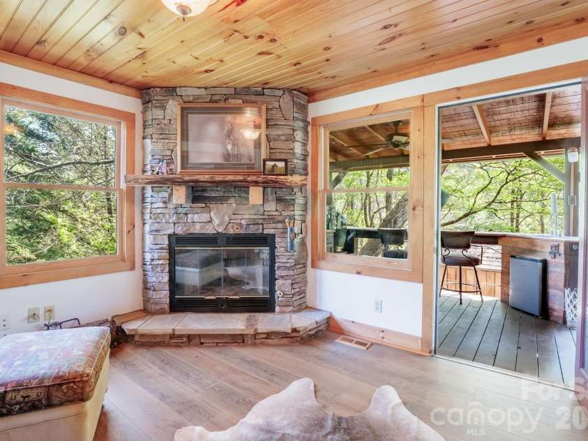 440 Huskey Road, Bryson City, NC 28713.  MLS# CAR4373659, YatesRealty ID 14570. Sunroom Main House