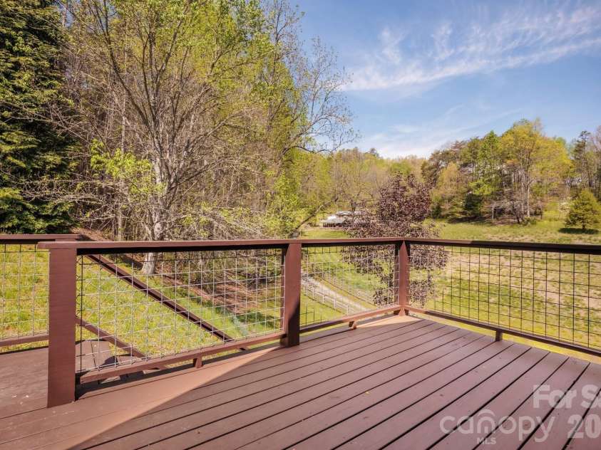 440 Huskey Road, Bryson City, NC 28713.  MLS# CAR4373659, YatesRealty ID 14570. Upstairs Deck Main HouseMaster