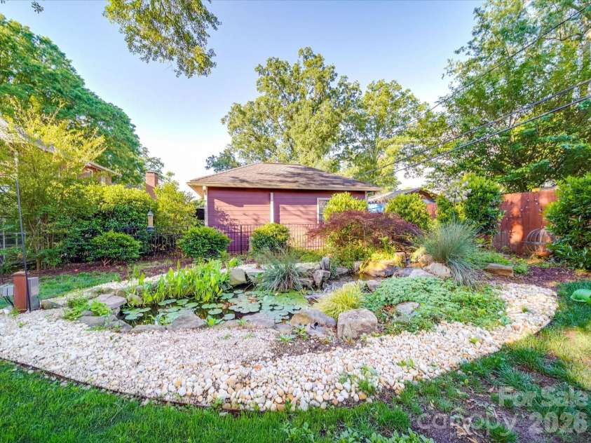 907 Edgewood Circle, Gastonia, NC 28052.  MLS# CAR4373699, YatesRealty ID 14571. Back Yard with Koi Pond
