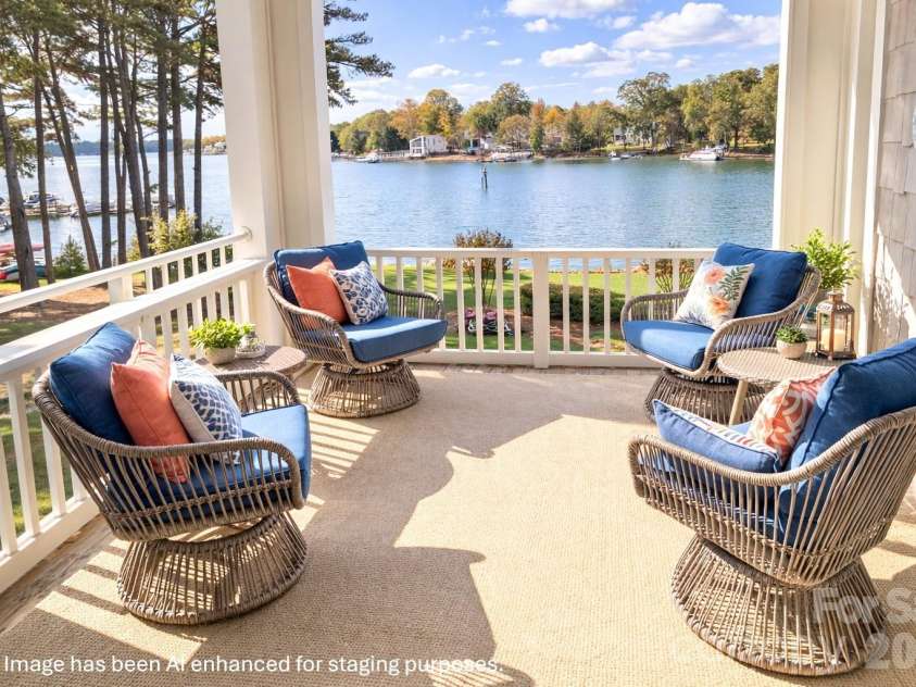 7822 Village Harbor Drive, Cornelius, NC 28031.  MLS# CAR4351828, YatesRealty ID 14578. Covered Lakefront Deck. Enjoy breathtaking waterfront views from this beautiful, covered deck. This space offers the perfect setting for relaxing mornings or sunset gatherings. Overlooking manicured green space a
