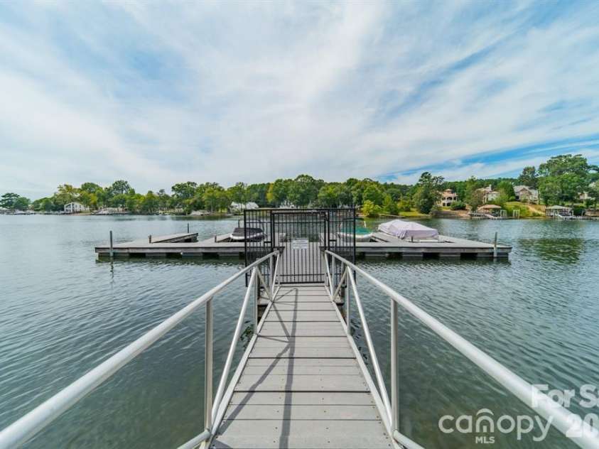 7822 Village Harbor Drive, Cornelius, NC 28031.  MLS# CAR4351828, YatesRealty ID 14578. Gated Boat Dock access