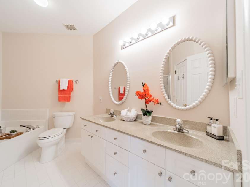 7822 Village Harbor Drive, Cornelius, NC 28031.  MLS# CAR4351828, YatesRealty ID 14578. Primary bath is generously sized, and it has a tub AND shower (see separate photo)