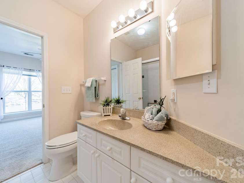 7822 Village Harbor Drive, Cornelius, NC 28031.  MLS# CAR4351828, YatesRealty ID 14578. Second bath