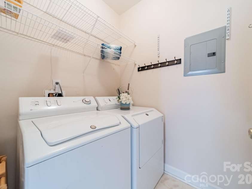 7822 Village Harbor Drive, Cornelius, NC 28031.  MLS# CAR4351828, YatesRealty ID 14578. Yes, it does have a dedicated laundry room - no lugging laundry to some remote area ... this is nice and convenient