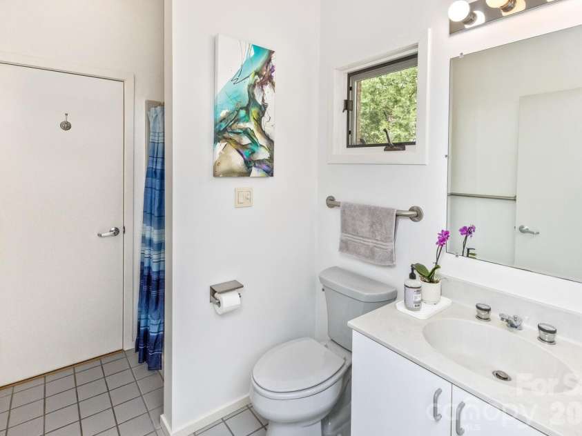 212 Chestnut Forest Road, Fairview, NC 28730.  MLS# CAR4372045, YatesRealty ID 14587. Bedroom 2  with adjoining bath