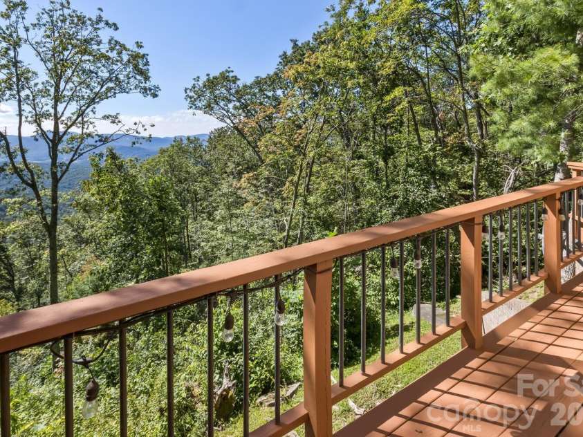212 Chestnut Forest Road, Fairview, NC 28730.  MLS# CAR4372045, YatesRealty ID 14587. Deck accessible from main floor  living area