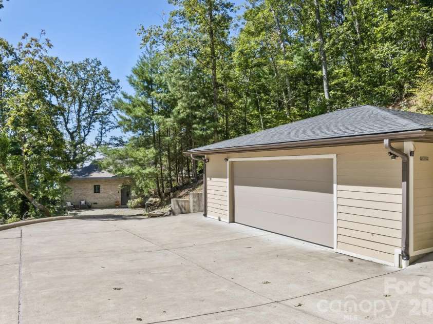 212 Chestnut Forest Road, Fairview, NC 28730.  MLS# CAR4372045, YatesRealty ID 14587. Detached garage and parking 