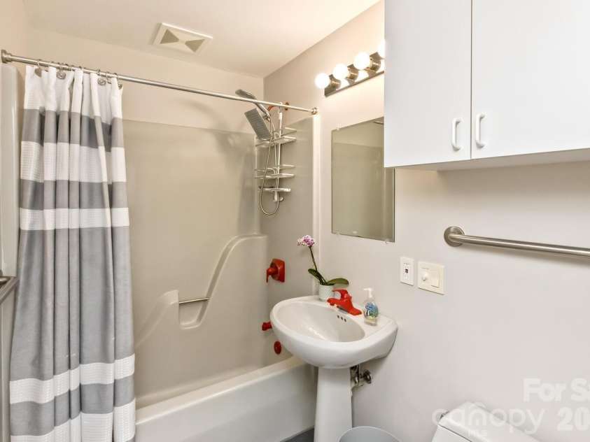 212 Chestnut Forest Road, Fairview, NC 28730.  MLS# CAR4372045, YatesRealty ID 14587. Downstairs full bath