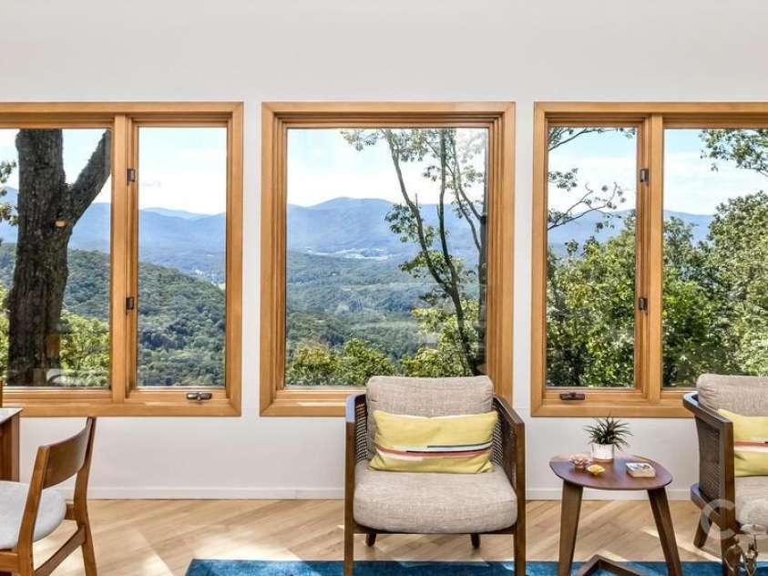 212 Chestnut Forest Road, Fairview, NC 28730.  MLS# CAR4372045, YatesRealty ID 14587. Expansive. Modern. Layered view. 