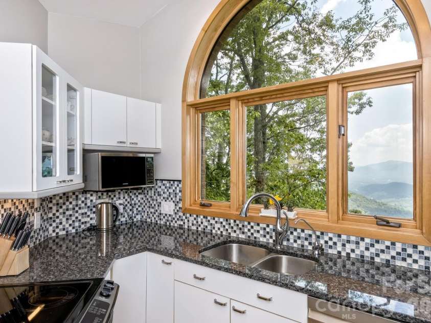 212 Chestnut Forest Road, Fairview, NC 28730.  MLS# CAR4372045, YatesRealty ID 14587. Modern and sleek design