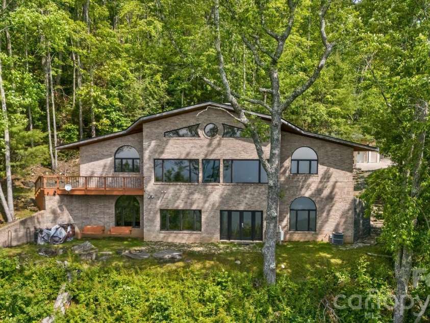 212 Chestnut Forest Road, Fairview, NC 28730.  MLS# CAR4372045, YatesRealty ID 14587. Nestled in the mountain side