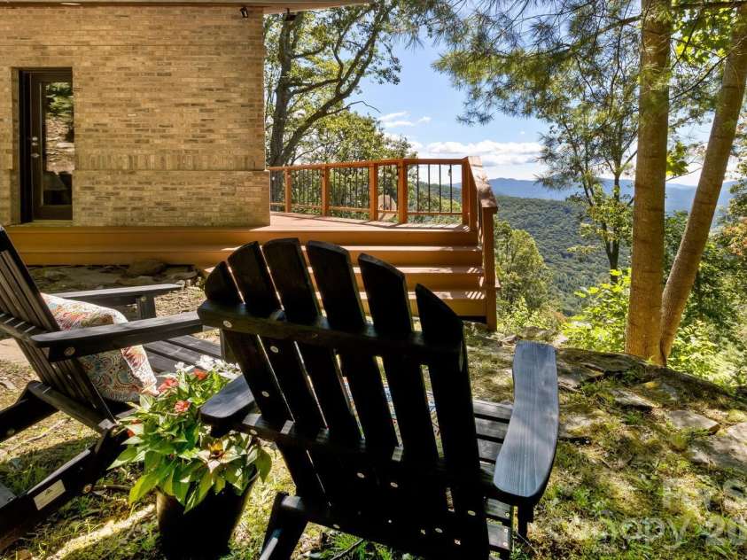 212 Chestnut Forest Road, Fairview, NC 28730.  MLS# CAR4372045, YatesRealty ID 14587. Private deck off primary bedroom 