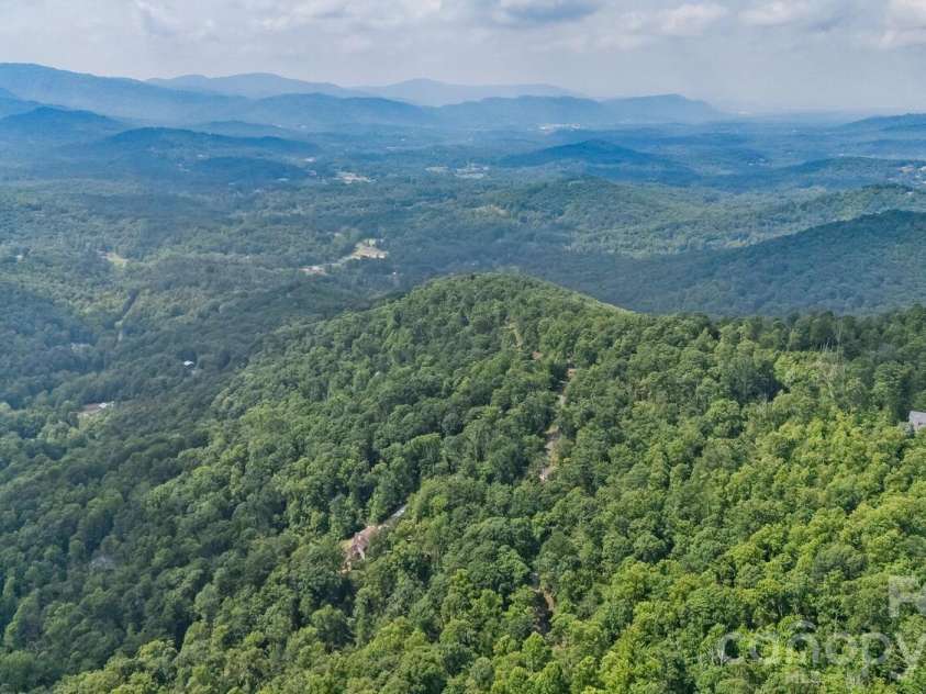 212 Chestnut Forest Road, Fairview, NC 28730.  MLS# CAR4372045, YatesRealty ID 14587. Sit and absorb this while you have dinner on the deck