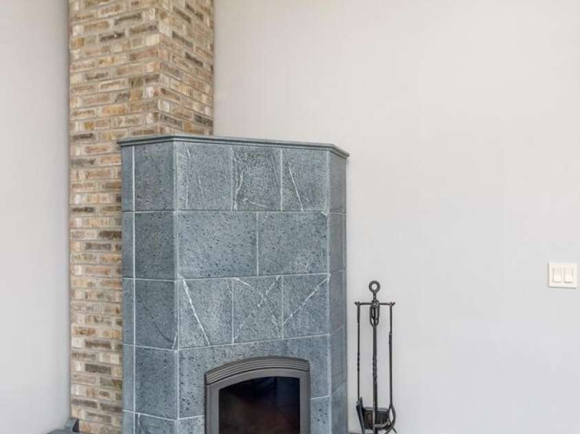 212 Chestnut Forest Road, Fairview, NC 28730.  MLS# CAR4372045, YatesRealty ID 14587. Soapstone fireplace