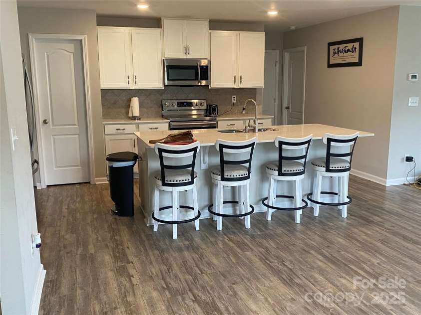 110 Silver Oak Circle, Rockwell, NC 28138.  MLS# CAR4123200, YatesRealty ID 1459. KItchen with large island ans walk in pantry