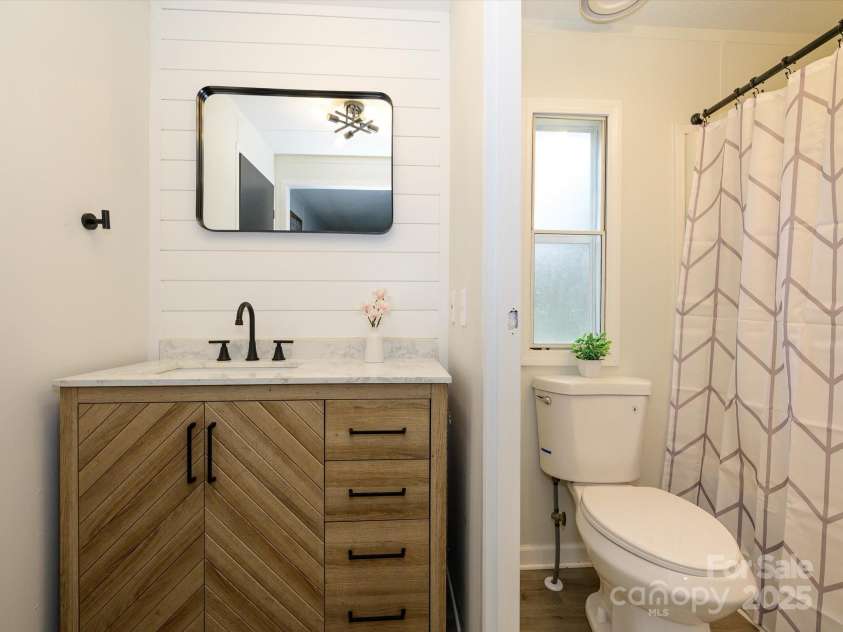 105 Mountain Brook Drive, Bessemer City, NC 28016.  MLS# CAR4237868, YatesRealty ID 14590. Primary bath suite with upgraded vanity.
