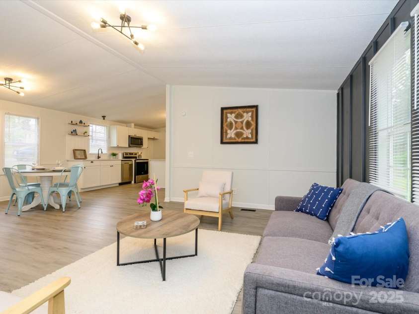 105 Mountain Brook Drive, Bessemer City, NC 28016.  MLS# CAR4237868, YatesRealty ID 14590. View from family room into the rest of open floor plan living area.