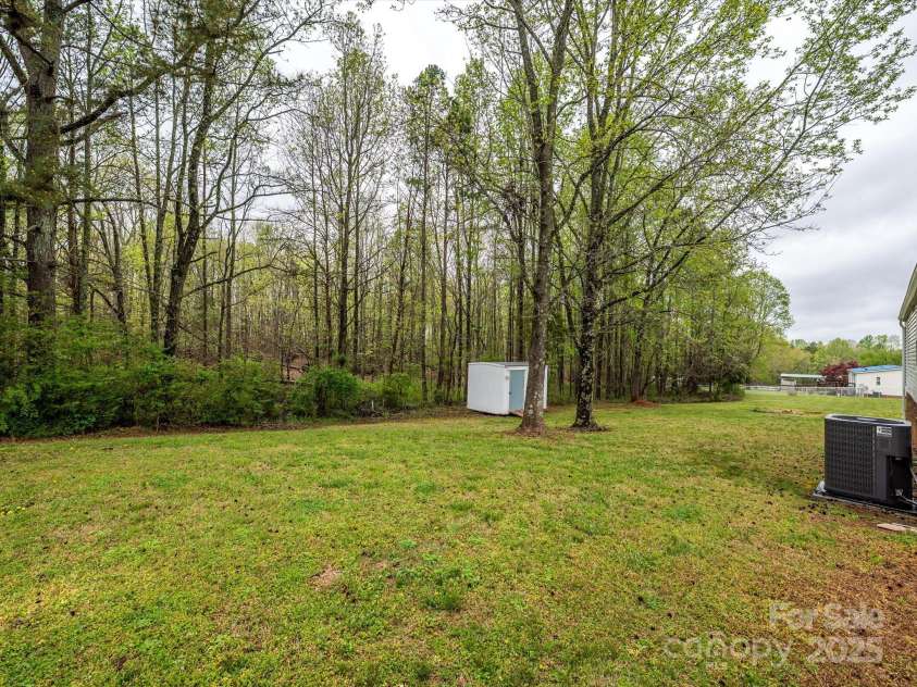 105 Mountain Brook Drive, Bessemer City, NC 28016.  MLS# CAR4237868, YatesRealty ID 14590. View of private rear yard.