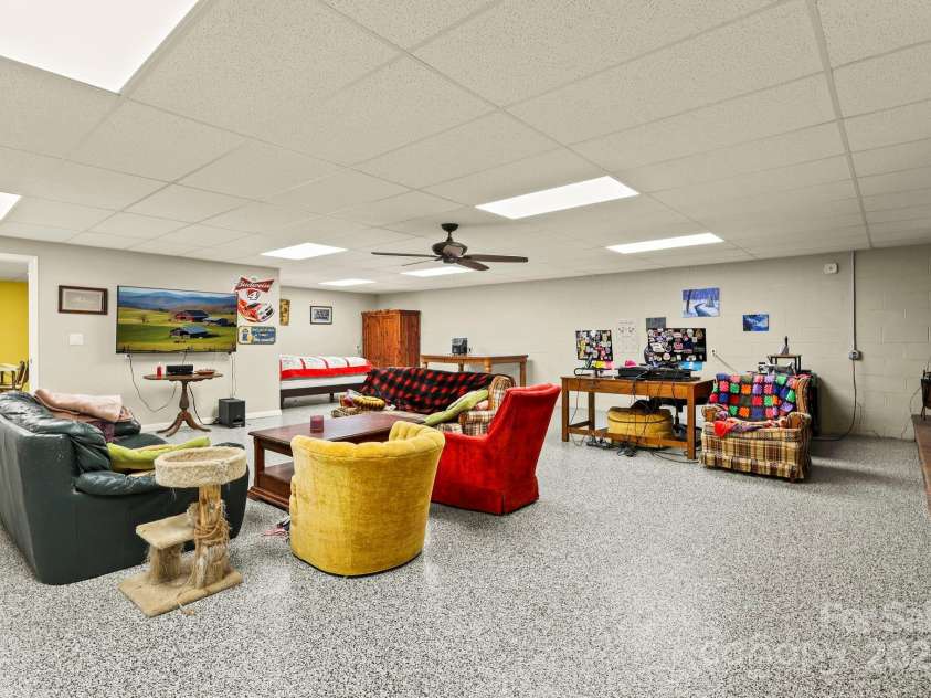 173 Chestnut Grove Road, Statesville, NC 28625.  MLS# CAR4244341, YatesRealty ID 14595. Basement Den