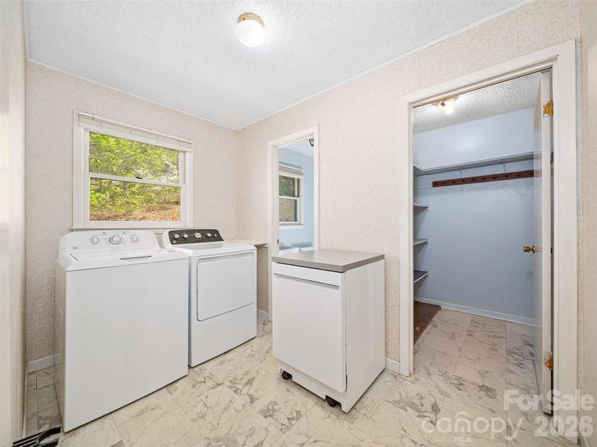 261 Shady Oak Road, Burnsville, NC 28714.  MLS# CAR4373735, YatesRealty ID 14595. Laundry room on main level.