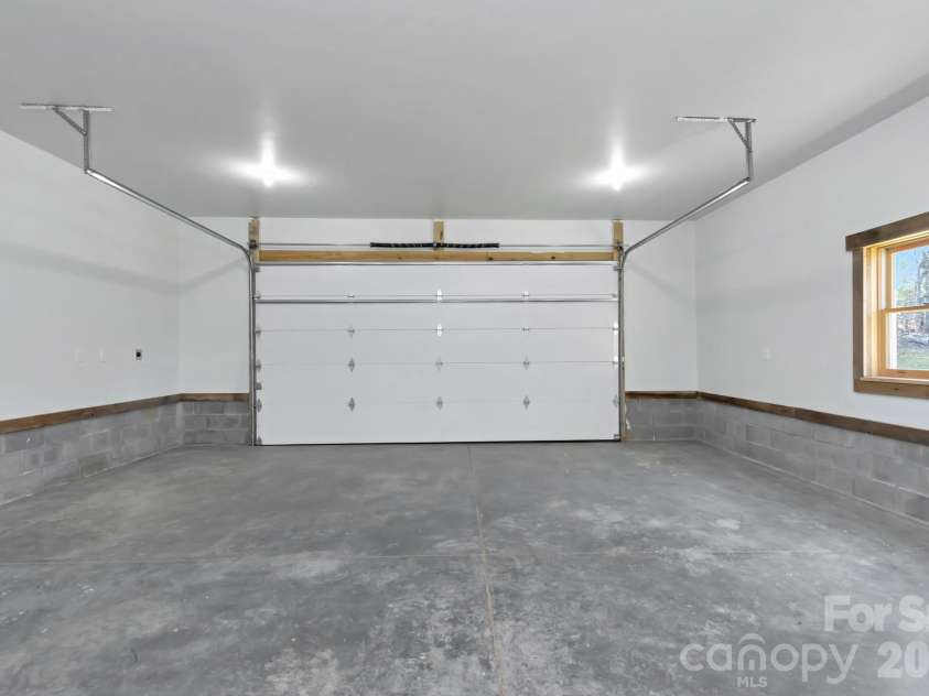 486 Hunter-Lysik Way, Laurel Springs, NC 28644.  MLS# CAR4325096, YatesRealty ID 14597. Attached Two Car Garage