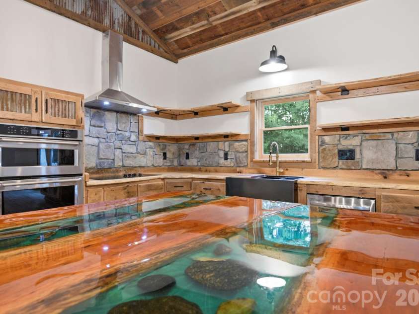 486 Hunter-Lysik Way, Laurel Springs, NC 28644.  MLS# CAR4325096, YatesRealty ID 14597. Custom Center Island