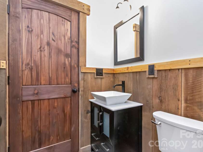 486 Hunter-Lysik Way, Laurel Springs, NC 28644.  MLS# CAR4325096, YatesRealty ID 14597. Main Level Guest Bathroom