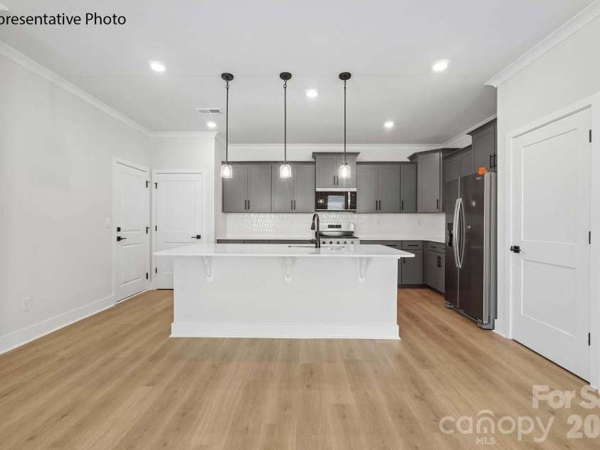 9303 Carver Avenue, Huntersville, NC 28078.  MLS# CAR4338041, YatesRealty ID 14607. 