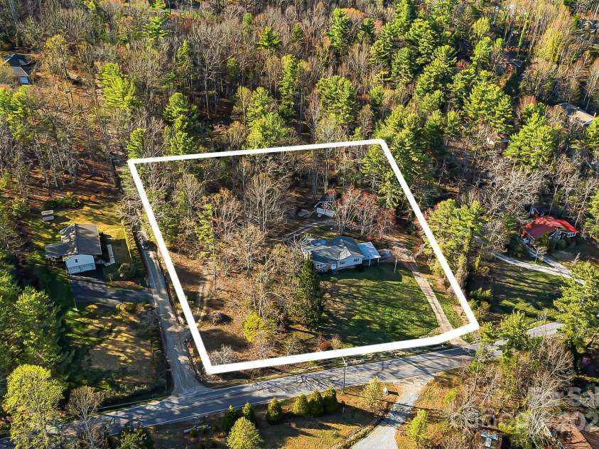 2221 Old Kanuga Road, Hendersonville, NC 28739.  MLS# CAR4242530, YatesRealty ID 14612. 
