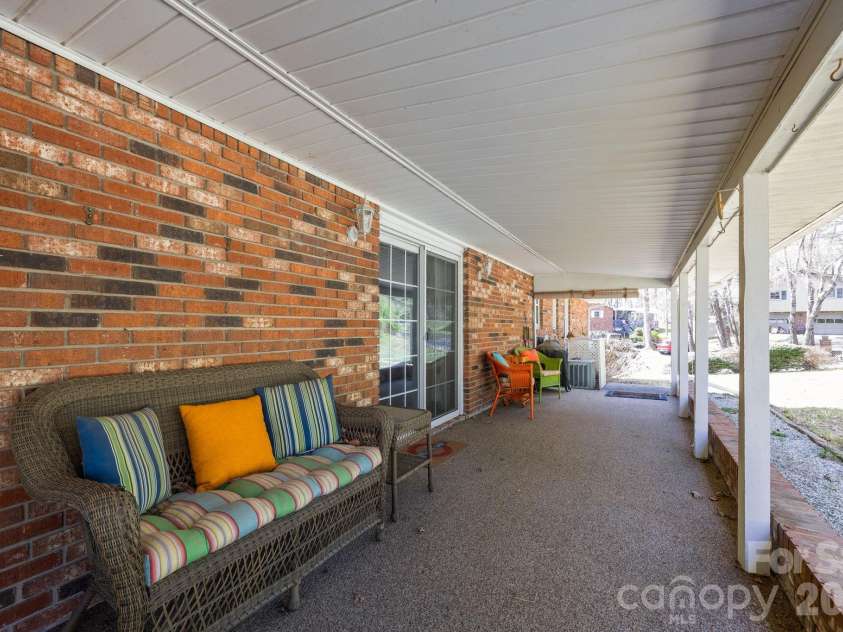 3124 Primrose Drive, Hendersonville, NC 28792.  MLS# CAR4358804, YatesRealty ID 14614. ENORMOUS BACK PATIO