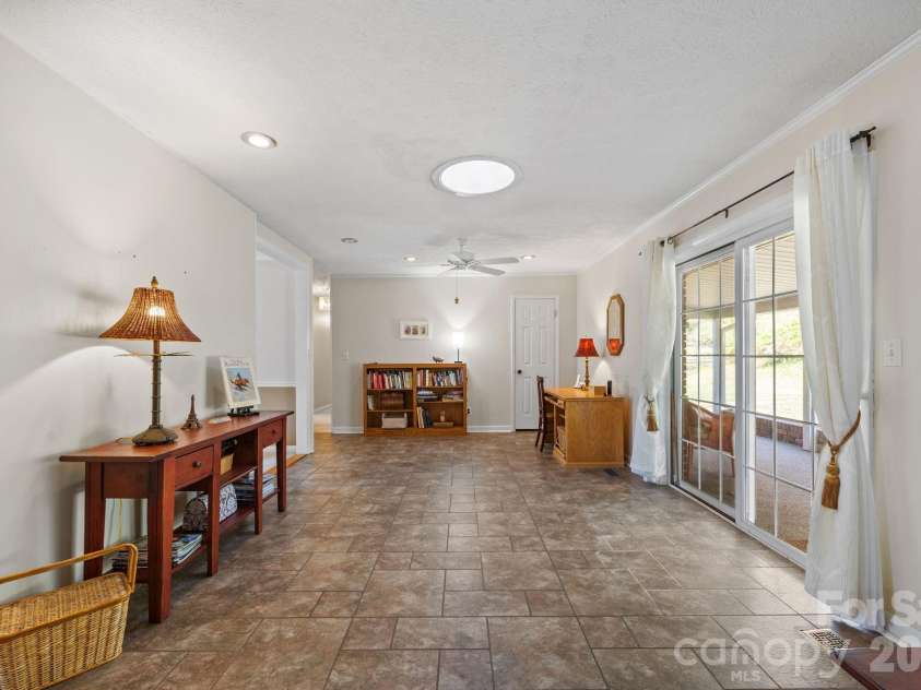 3124 Primrose Drive, Hendersonville, NC 28792.  MLS# CAR4358804, YatesRealty ID 14614. OPEN TO COVERED BACK PATIO