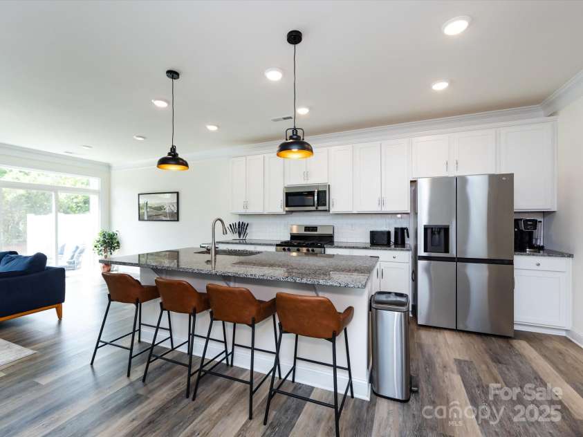 2141 Bexar Trail, Matthews, NC 28105.  MLS# CAR4255990, YatesRealty ID 14621. Kitchen with large island