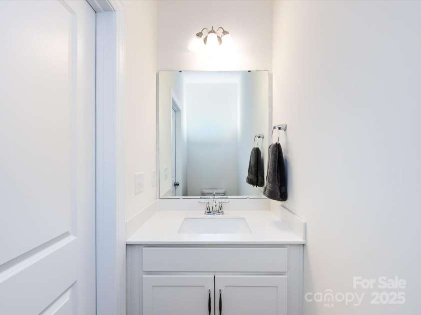 2141 Bexar Trail, Matthews, NC 28105.  MLS# CAR4255990, YatesRealty ID 14621. Powder room