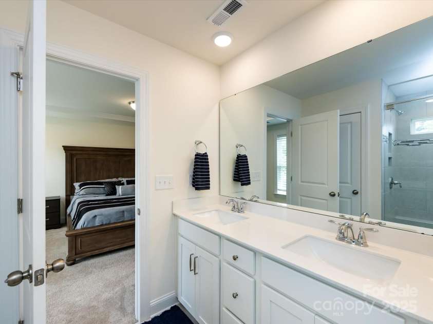 2141 Bexar Trail, Matthews, NC 28105.  MLS# CAR4255990, YatesRealty ID 14621. Primary bath with double vanity