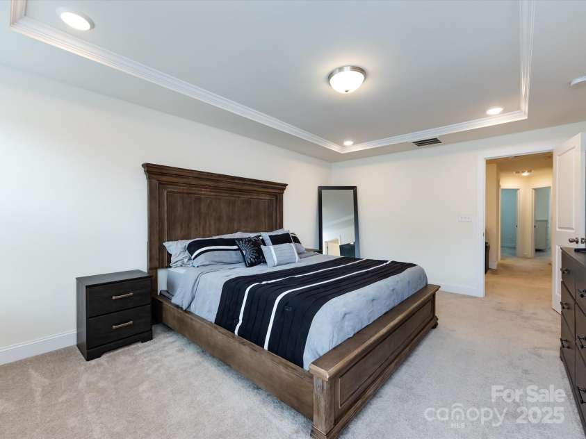 2141 Bexar Trail, Matthews, NC 28105.  MLS# CAR4255990, YatesRealty ID 14621. Primary bedroom