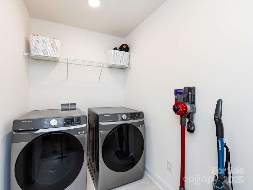 2141 Bexar Trail, Matthews, NC 28105.  MLS# CAR4255990, YatesRealty ID 14621. Upstairs Laundry room
