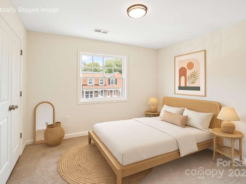 1215 Green Oaks Lane, Charlotte, NC 28205.  MLS# CAR4256711, YatesRealty ID 14622. Primary bedroom with private wooded view.