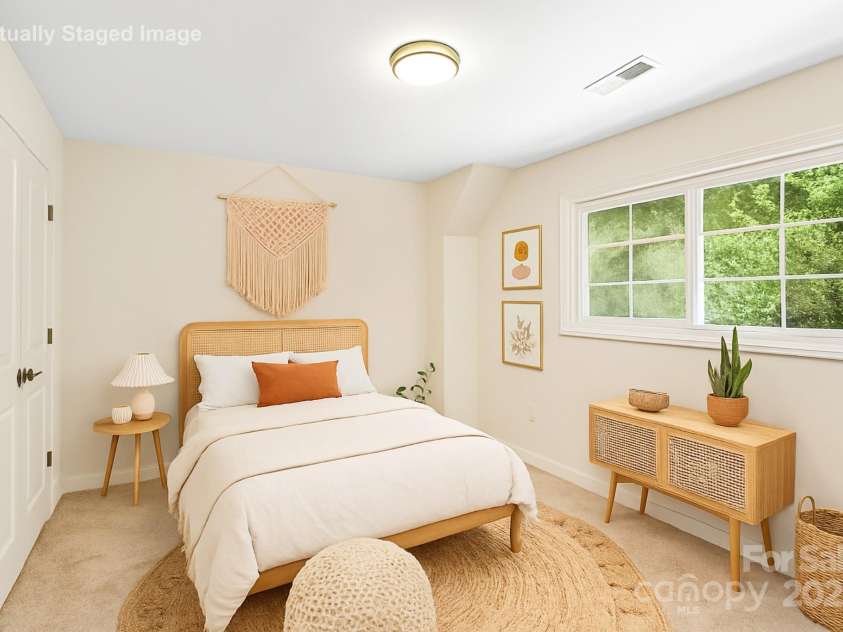 1215 Green Oaks Lane, Charlotte, NC 28205.  MLS# CAR4256711, YatesRealty ID 14622. Secluded enclosed patio with peaceful wooded backdrop.