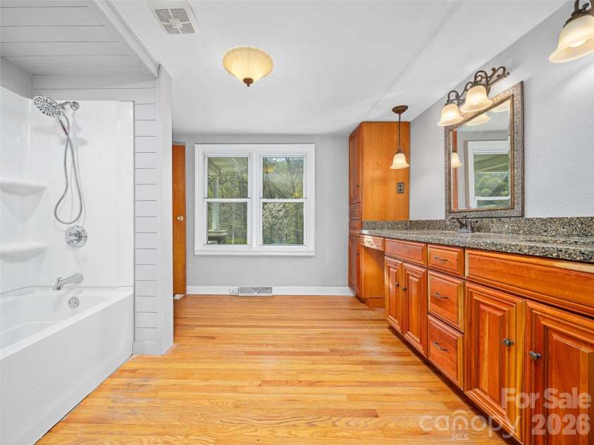 58 Possum Trot Road, Bakersville, NC 28705.  MLS# CAR4371183, YatesRealty ID 14626. 