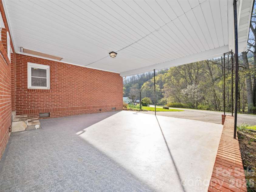 58 Possum Trot Road, Bakersville, NC 28705.  MLS# CAR4371183, YatesRealty ID 14626. 