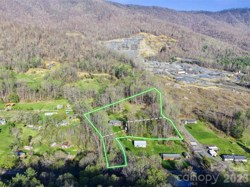 58 Possum Trot Road, Bakersville, NC 28705.  MLS# CAR4371183, YatesRealty ID 14626. 