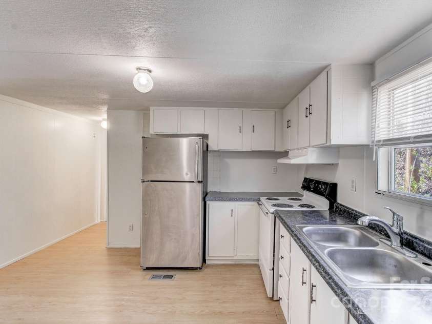6 & 10 Lands End Drive, Candler, NC 28715.  MLS# CAR4242356, YatesRealty ID 14627. 