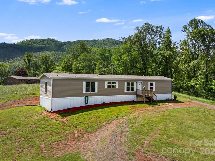 410 Fork Mountain Road, Bakersville, NC 28705.  MLS# CAR4264670, YatesRealty ID 14631. 