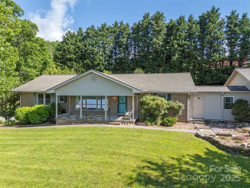 418 Mountain Page Road, Saluda, NC 28773.  MLS# CAR4315748, YatesRealty ID 14636. 