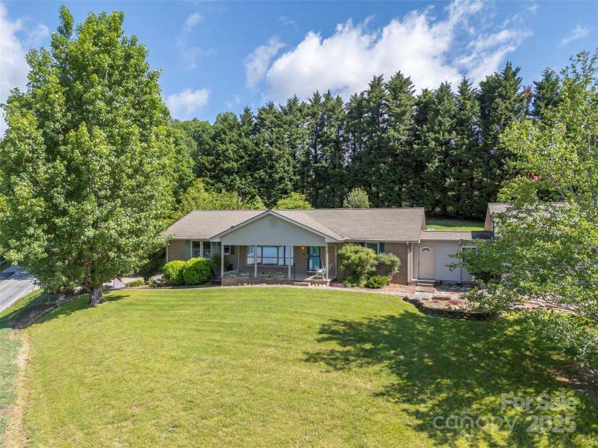 418 Mountain Page Road, Saluda, NC 28773.  MLS# CAR4315748, YatesRealty ID 14636. 