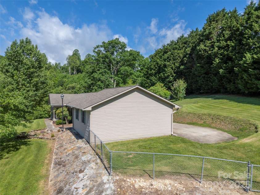 418 Mountain Page Road, Saluda, NC 28773.  MLS# CAR4315748, YatesRealty ID 14636. 