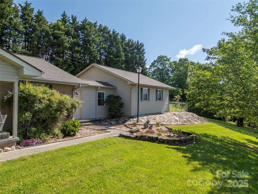 418 Mountain Page Road, Saluda, NC 28773.  MLS# CAR4315748, YatesRealty ID 14636. 