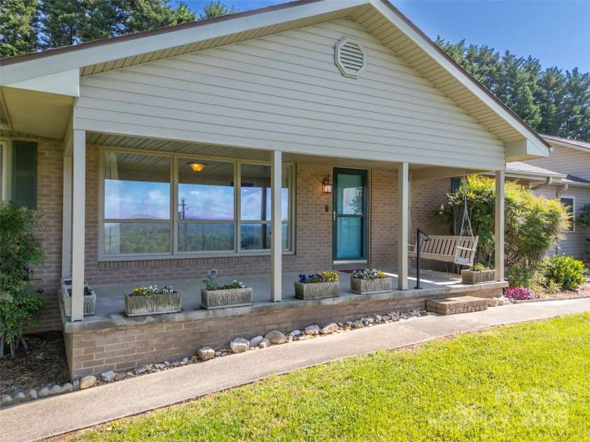 418 Mountain Page Road, Saluda, NC 28773.  MLS# CAR4315748, YatesRealty ID 14636. 